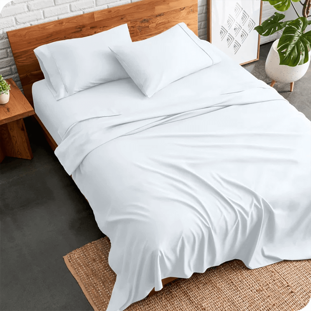white bed sheet hotel